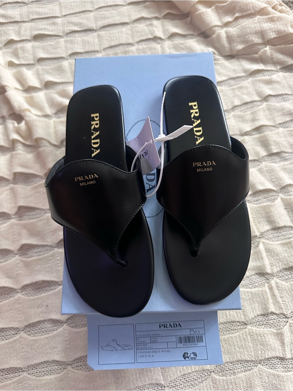 Prada Black Leather Thong Slides with Gold Logo